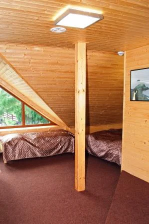 Útulný dřevěný podkrovní pokoj Pomeranche